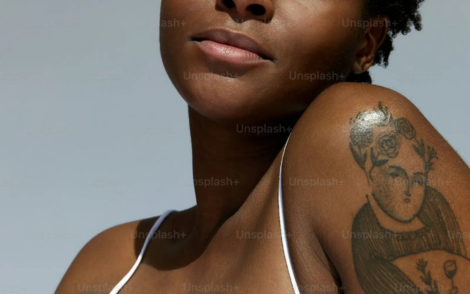 Woman with tattoo on her arm
